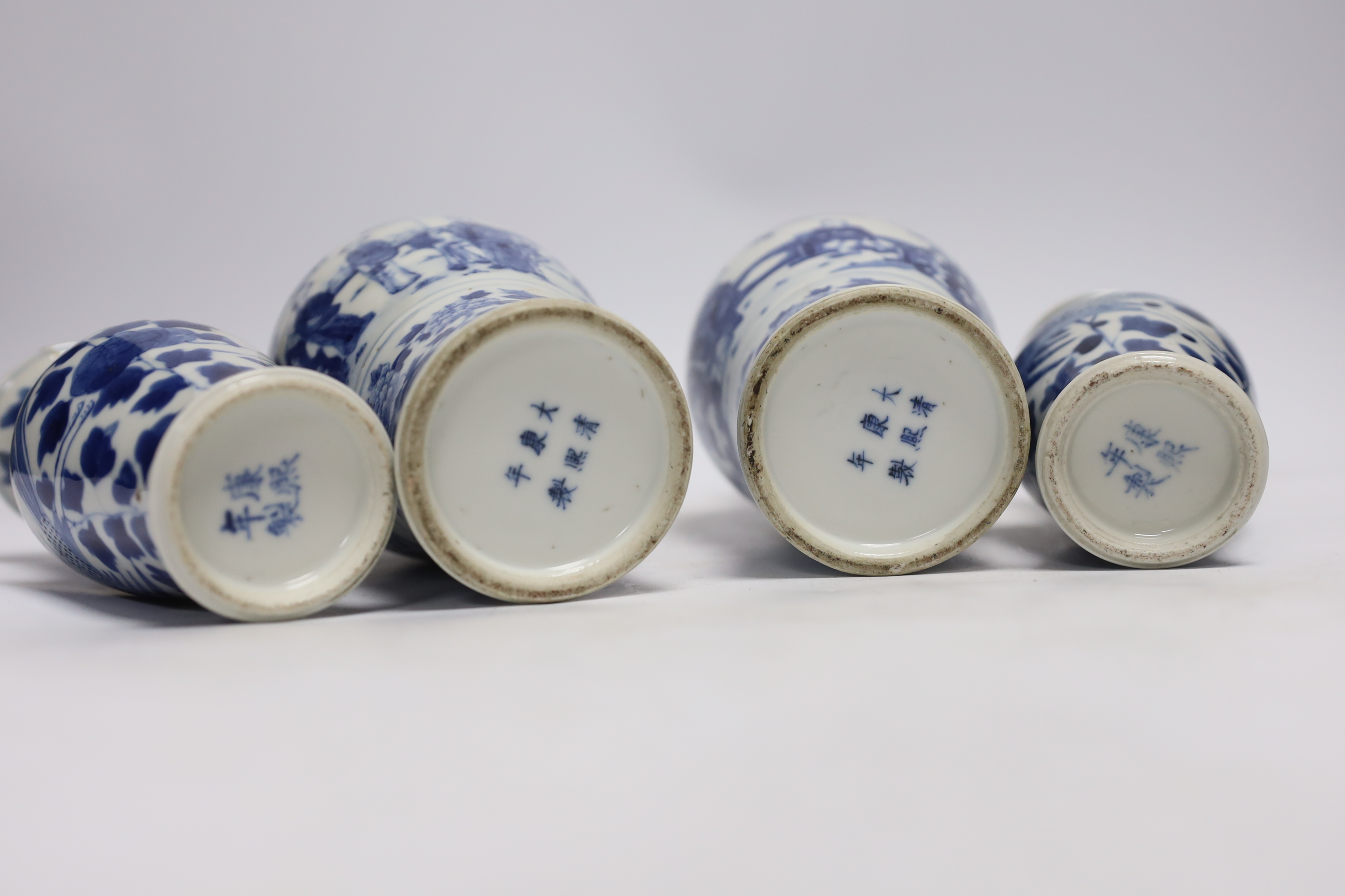 Two pairs of Chinese blue and white vases, largest 19cm high